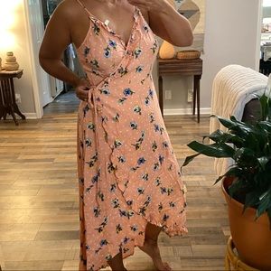 T A peach floral print low cut wrap dress. 2X